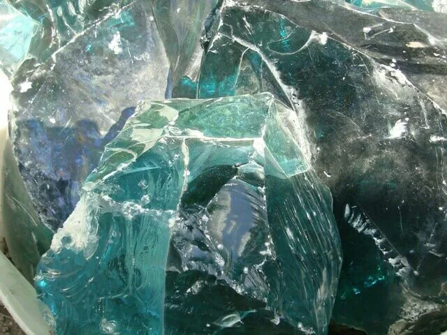 Turquoise decorative glass rocks for garden features